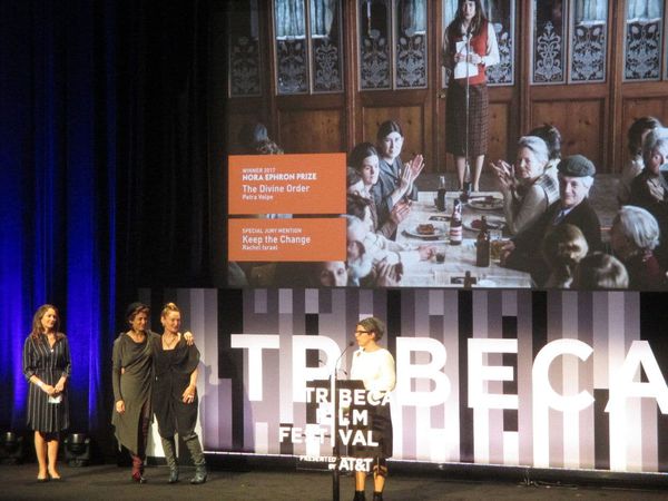 Diane Lane with The Divine Order actresses Marta Zoffoli and Rachel Braunschweig as director Petra Volpe accepts the Nora Ephron Prize. The film has also won the Best Narrative Audience Award.